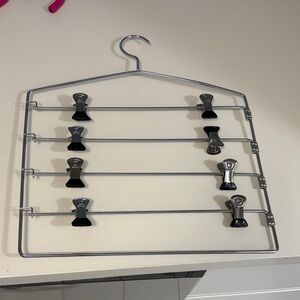Silver Multi-Tier Hanger with one with Black Clips, and two other. Set of three